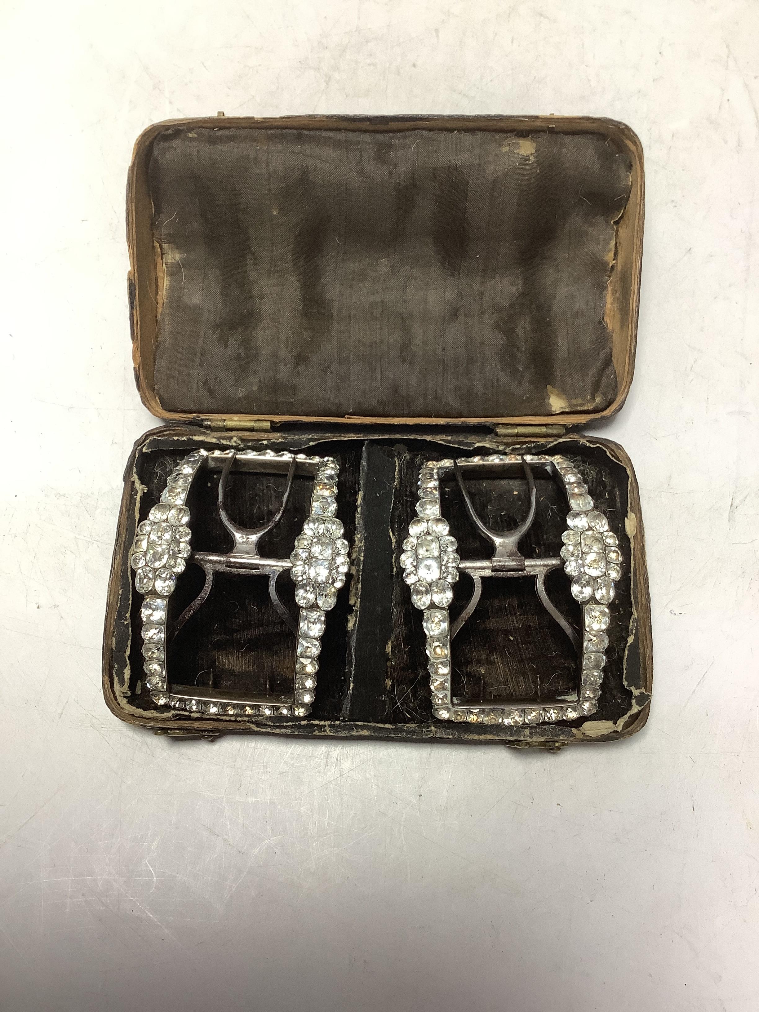 A cased pair of Georgian white metal, steel and white paste cluster set shoe buckles, 58mm, in original box